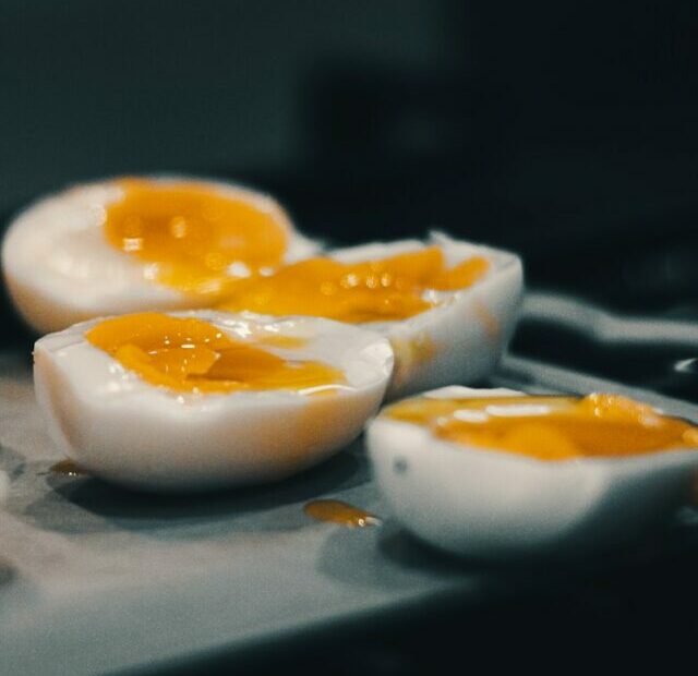 hard boiled eggs are sitting on a tray